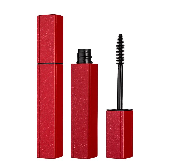 Quali sono le caratteristiche del design della testa del pennello mascara e che effetto ha sull'effetto trucco delle ciglia?